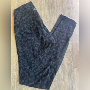 Lululemon running pant, size 4 - black print
